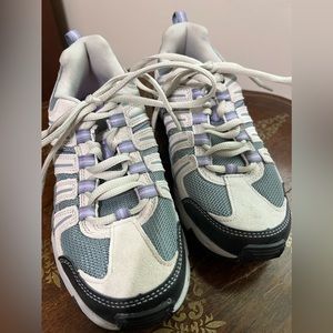 Gray Fila tennis shoes with light purple accents